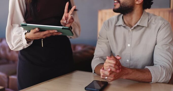 Cafe, hands and waitress with tablet for choice, online menu and suggestion. Small business, employee and digital app in coffee shop for hospitality, service or help with man for order or decision
