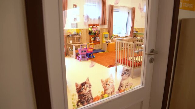 Daycare room interior with furniture, cribs, and playful wall decorations, Kindergarten room prepared for children, providing a safe and stimulating environment for learning and play