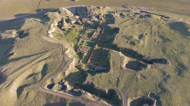 Cinematic aerial drone video of Gordion Ancient City near Polatli in Ankara, Turkey, showcasing the Midas Tumulus, ancient ruins, and wide historical landscape from above.