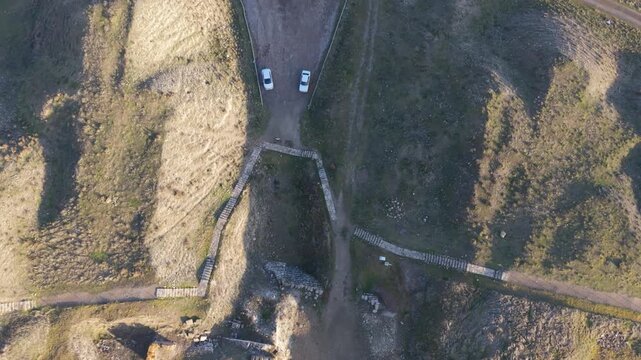Cinematic aerial drone video of Gordion Ancient City near Polatli in Ankara, Turkey, showcasing the Midas Tumulus, ancient ruins, and wide historical landscape from above.