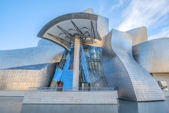 Guggenheim Museum Bilbao, Main Entrance and Glass Atrium, Titanium Facade and Reflecting Pond, Spain