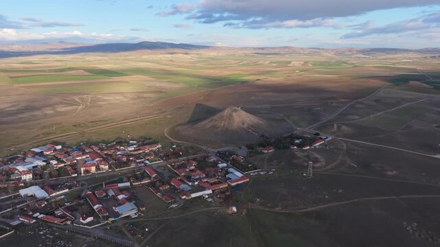 Cinematic aerial drone video of Gordion Ancient City near Polatli in Ankara, Turkey, showcasing the Midas Tumulus, ancient ruins, and wide historical landscape from above.