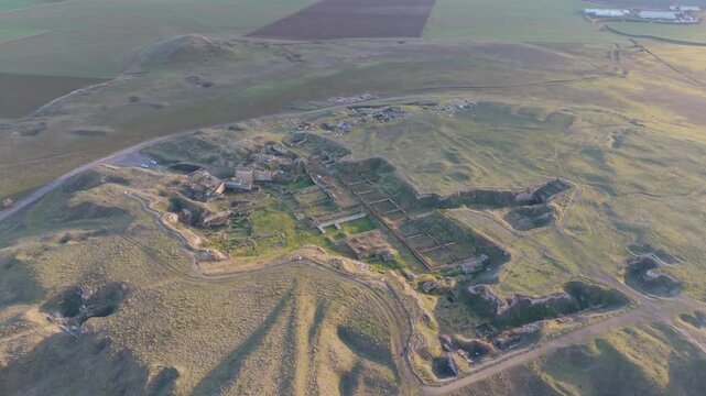 Cinematic aerial drone video of Gordion Ancient City near Polatli in Ankara, Turkey, showcasing the Midas Tumulus, ancient ruins, and wide historical landscape from above.