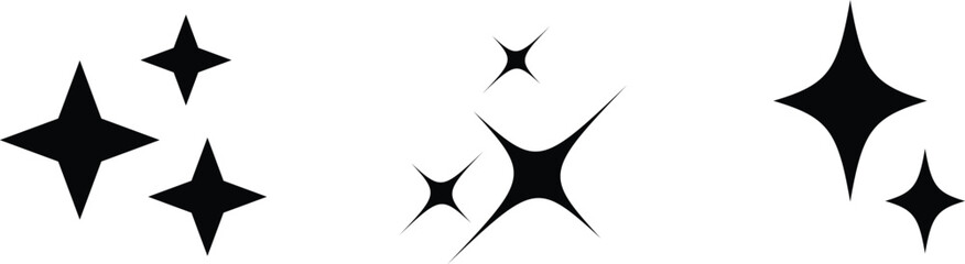 Multiple shining black sparkle symbols arranged on a clean white background creating a simple visual