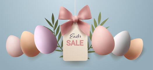 Naklejka premium Easter eggs pastel colors gift tag ribbon bow leaves blue background decorative banner
