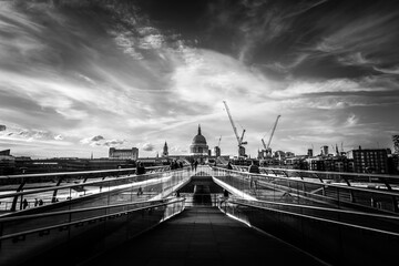 Fototapeta premium Black and White View of Millennium Bridge Leading to St Paul’s Cathedral in London, England