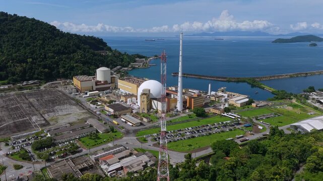 Aerial view of Angra dos Reis nuclear power plant complex beside tropical bay, Rio de Janeiro, Brazil