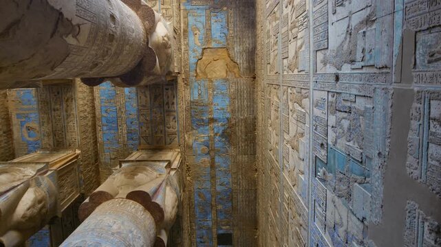 Dendera temple or Temple of Hathor. Painted columns with goddess faces and hieroglyphic ceiling of the hypostyle hall. Downscaled from 6k.