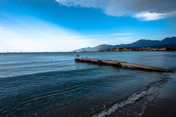 Fototapeta premium Pier extending into calm sea
