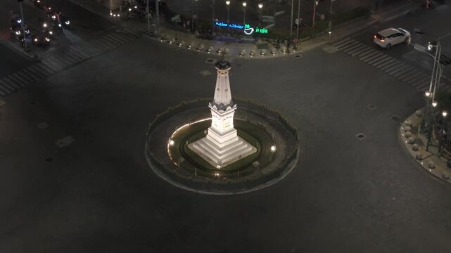 Tugu Jogja Landmark at Night with City Traffic