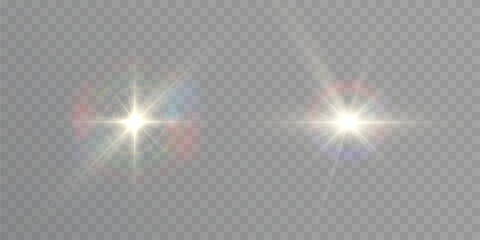 Bright light sources showing optical lens flare with colorful spectral glow on a transparent background © Valeriia