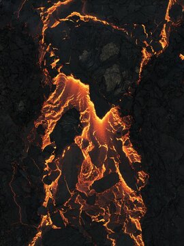 Aerial view of molten lava snakes through the dark, fractured earth, a fiery scar on the landscape, Grindavik, Iceland.