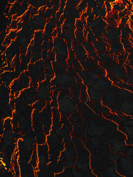 Aerial view of fiery orange cracks snake across the stark black earth, a molten tapestry of destruction and rebirth, Grindavik, Grindavikurbaer, Iceland.