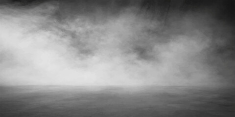 Fototapeta premium A dramatic black and white cloudscape of dark stormy clouds creates an abstract nature background filled with gray fog and motion