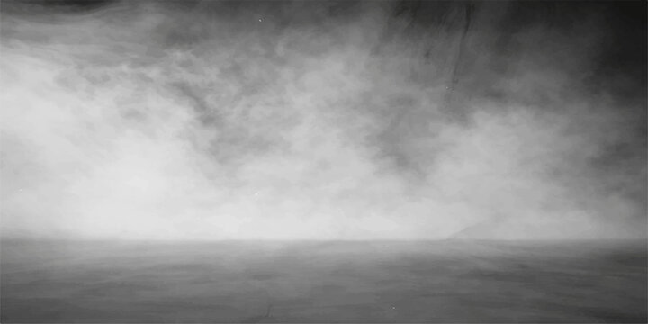 Dramatic black and white grunge background featuring abstract dark storm clouds and swirling mist over a textured grey sky
