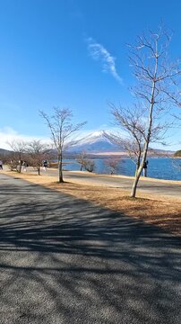 Lake Yamanaka or Yamanakako in Yamanashi Prefecture near Mount Fuji, Japan. Lake Yamanaka is the largest of the Fuji Five Lakes in clearly day and sky in Autumn Winter Season. Travel Nature Stable Foo