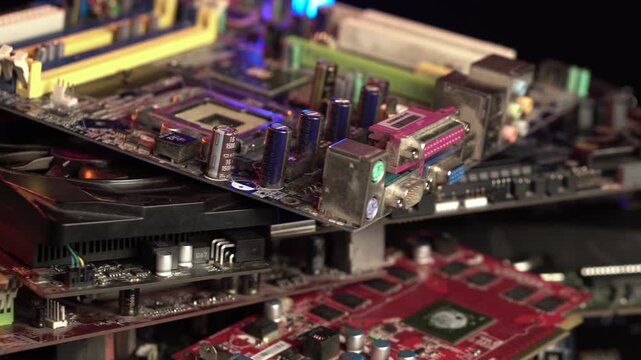 Computer Parts as Electronic Waste, Heap of Motherboards and Graphic Cards