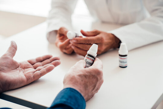 Doctor advising on homeopathic remedy during a medical consultation