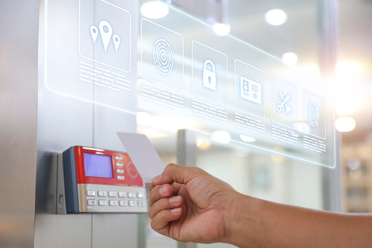 Hand scanning proximity ID card on reader access control system with security icons for door unlock and identity or verification identify icons for safety detect fingerprint scan or check attendance.