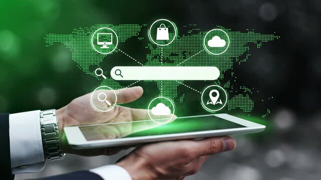 Business professional holding tablet with holographic search bar, world map, and connected icons including shopping bag, monitor, cloud, location pin. Global internet and ecommerce digital platform .