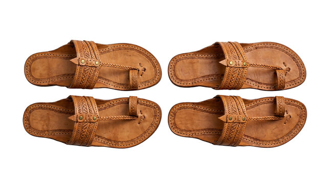 Authentic Kolhapuri chappals, traditional handcrafted Indian leather sandals with intricate patterns, a cultural footwear from Kolhapur, Maharashtra, India, studio shot