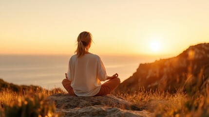 A serene person meditating on a rock while watching a breathtaking sunset over a vast ocean, symbolizing peace, mindfulness, and connection with nature.