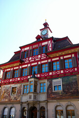 Fototapeta premium Stein am Rhein, Switzerland – September 11, 2023: Famous painted facades in the historic center