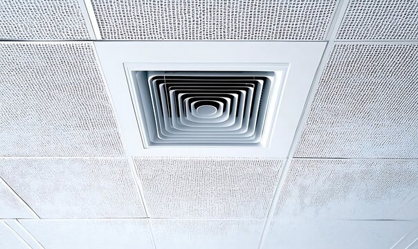 Ceiling Air Vent in Office Interior with Acoustic Tiles
