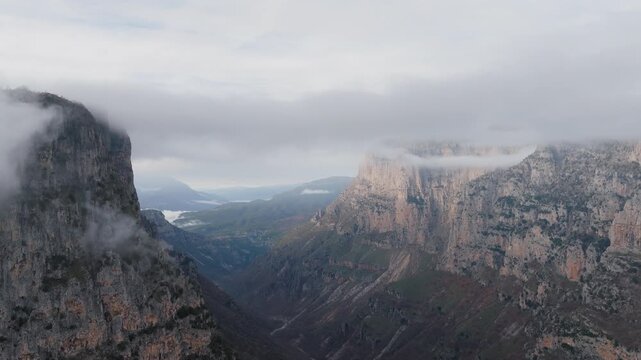 Dramatic Cliffs and Low Clouds over Vikos Gorge, Epirus, Greece, Adventure Tourism, Untouched Nature