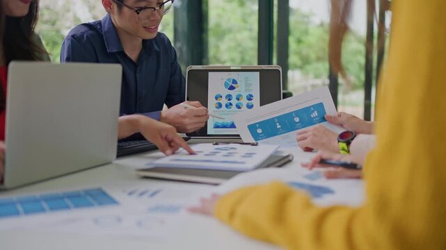 Group of creative Businesspeople brain storm meeting presentation,discussing roadmap to product launch, planning,strategy,dashboard,new business development,working with new startup project in office
