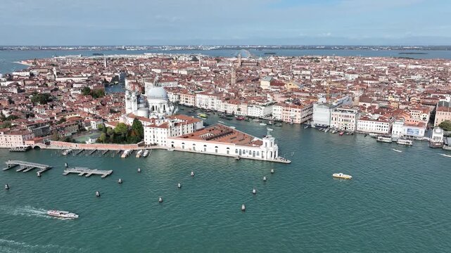 Aerial view of Punta della Dogana and Basilica di Santa Maria della Salute on the Grand Canal, Venice