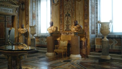 Ornate museum interior with blurred bokeh background, soft shallow focus on marble floor and pedestals  background backdrop copyspace calm. © Krakenimages.com