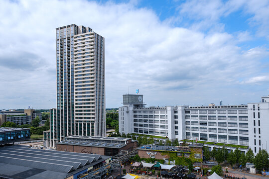 Eindhoven, Netherlands - June 28, 2025: Strijp S district in Eindhoven showcasing modern architecture with high-rise buildings and vibrant market atmosphere, ideal for urban exploration