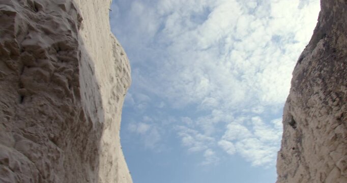 Wide 360 panning shot looking up in between three chalk stacks at botany Bay Beach at low tide. At marine Drive, Broadstairs