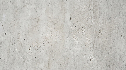 Obraz premium Light grey rough concrete wall with visible tool marks, pitting, fine cracks, embedded pebbles and raw textured surface.