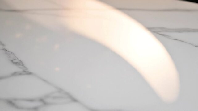 Abstract marble texture with soft light highlights, creating a luxurious and elegant background