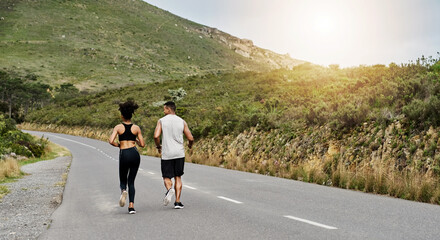 Obraz premium Workout, couple and support with running in road for marathon practice, pace training and health. Active relationship, back of people and jog outdoor for race challenge, sport performance or wellness
