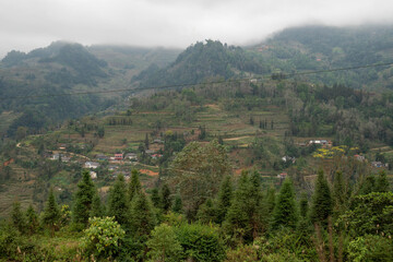 Fototapeta premium Misty hills and mountains panorama