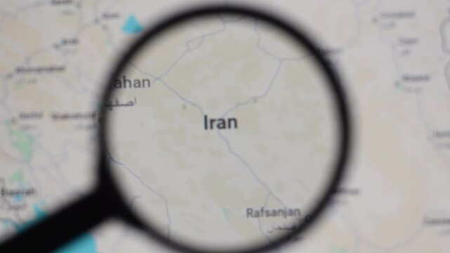 Video of Iran on a map through a magnifying glass. Civil unrest, military coup, minority, atrocity, Tehran, fishing, petroleum, Israel, war, United States, attack, Farsi, Tehran, Shiraz, Shia.