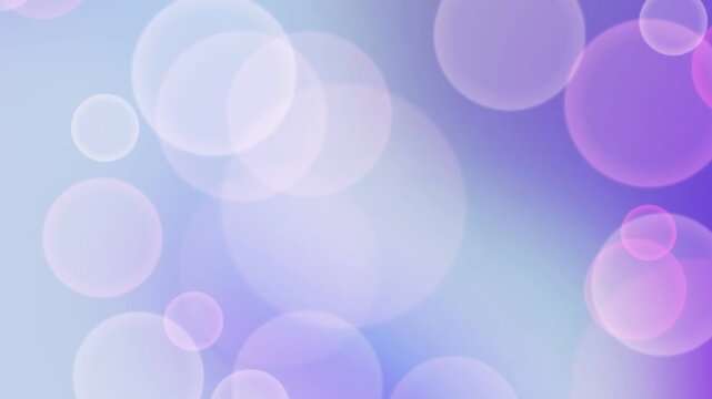 A dreamy abstract gradient of violet, blue, and light purple with bokeh