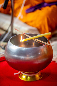Buddhist Holy Water Bowl with Burning Candle and Incense - Thai Blessing Ritual