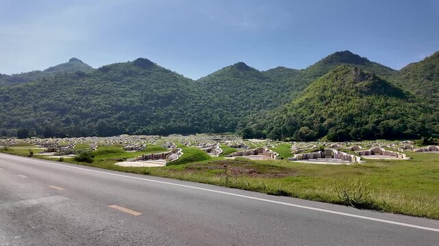 Kanchanaburi, Thailand - November 29, 2025: Chinese culture outside China in a traditional cemetery landscape