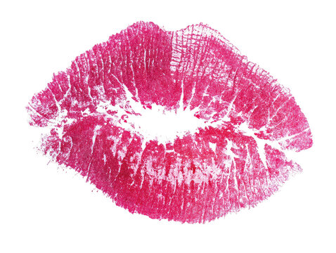 Close-up of a pink lipstick imprint on a black background
