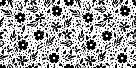Black and white floral pattern with scattered dots and leafy branches