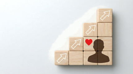 Wooden blocks with human silhouette and heart