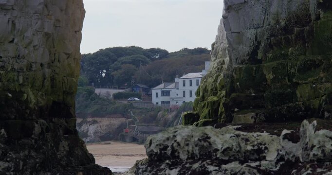 Mid shot looking though the Kingsgate Arch chalk stack with Kingsgate bay in background.