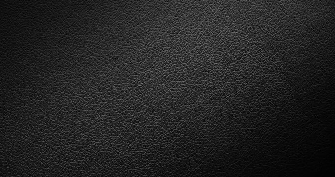 Black Leather Texture Background with Smooth Rotation. A high-resolution dark leather texture background captured in smooth, rotational motion.