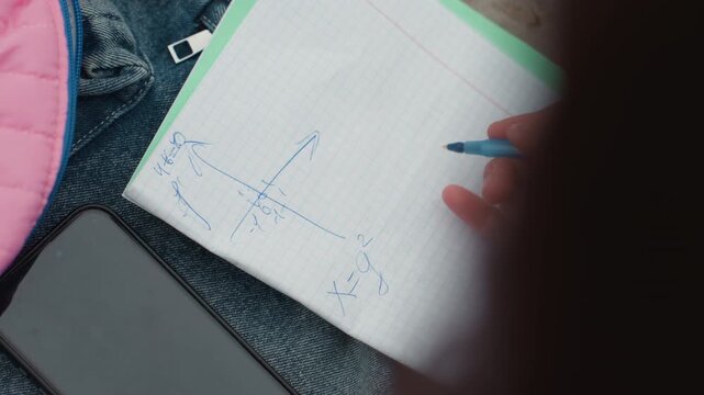 Student drawing graph on grid paper with blue pen, plotting axes and coordinates beside phone and pink backpack, casual outdoor study scene frames shift between math practice, tutor prep and quick