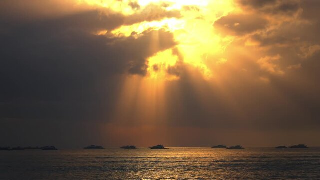 Majestic Jacob's Ladder Sun Rays Descending over Tropical Ocean