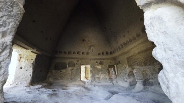 Cinematic shot of historic cave churches at Selime Castle in Cappadocia, Turkey